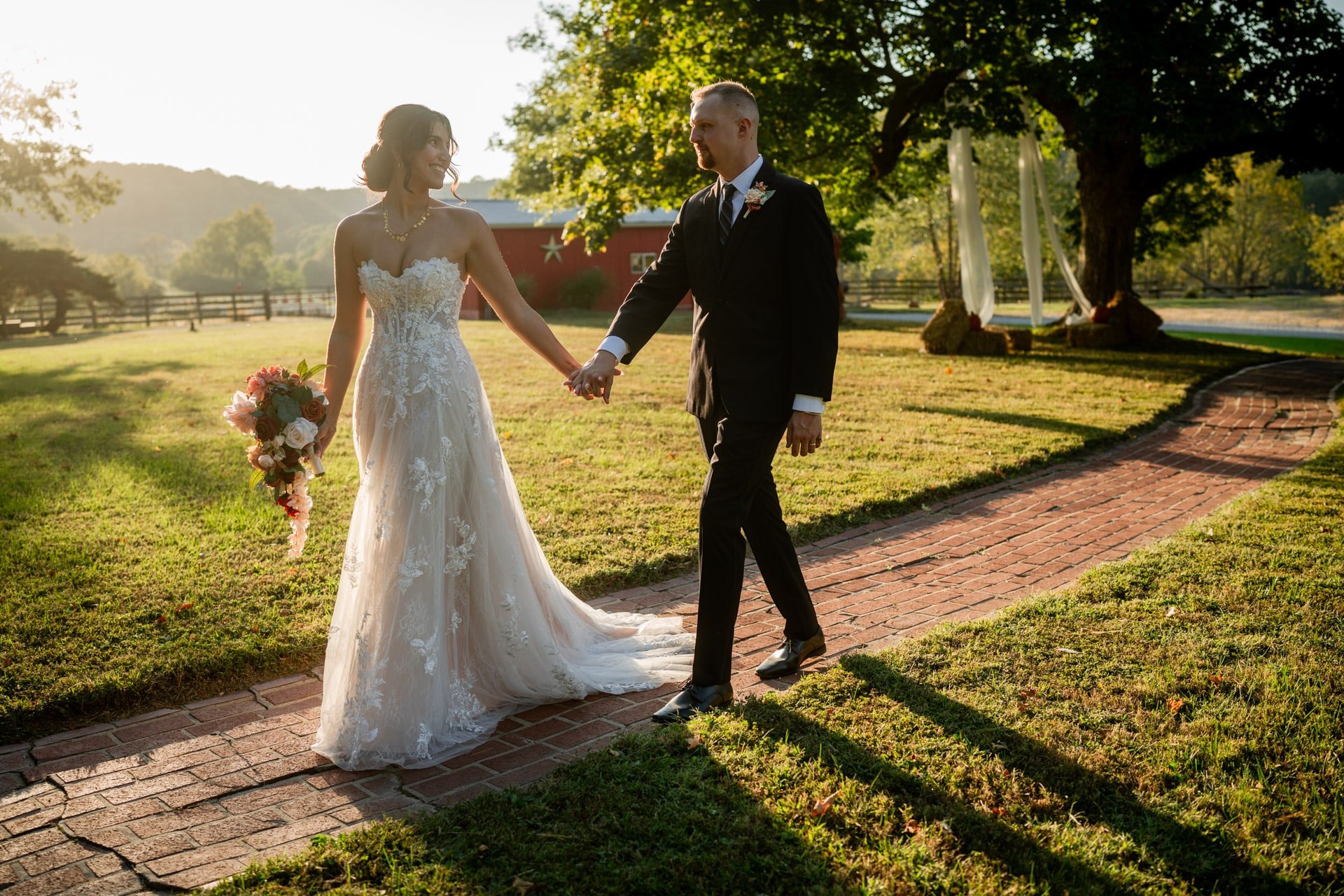 bride and groom walking hand in hand