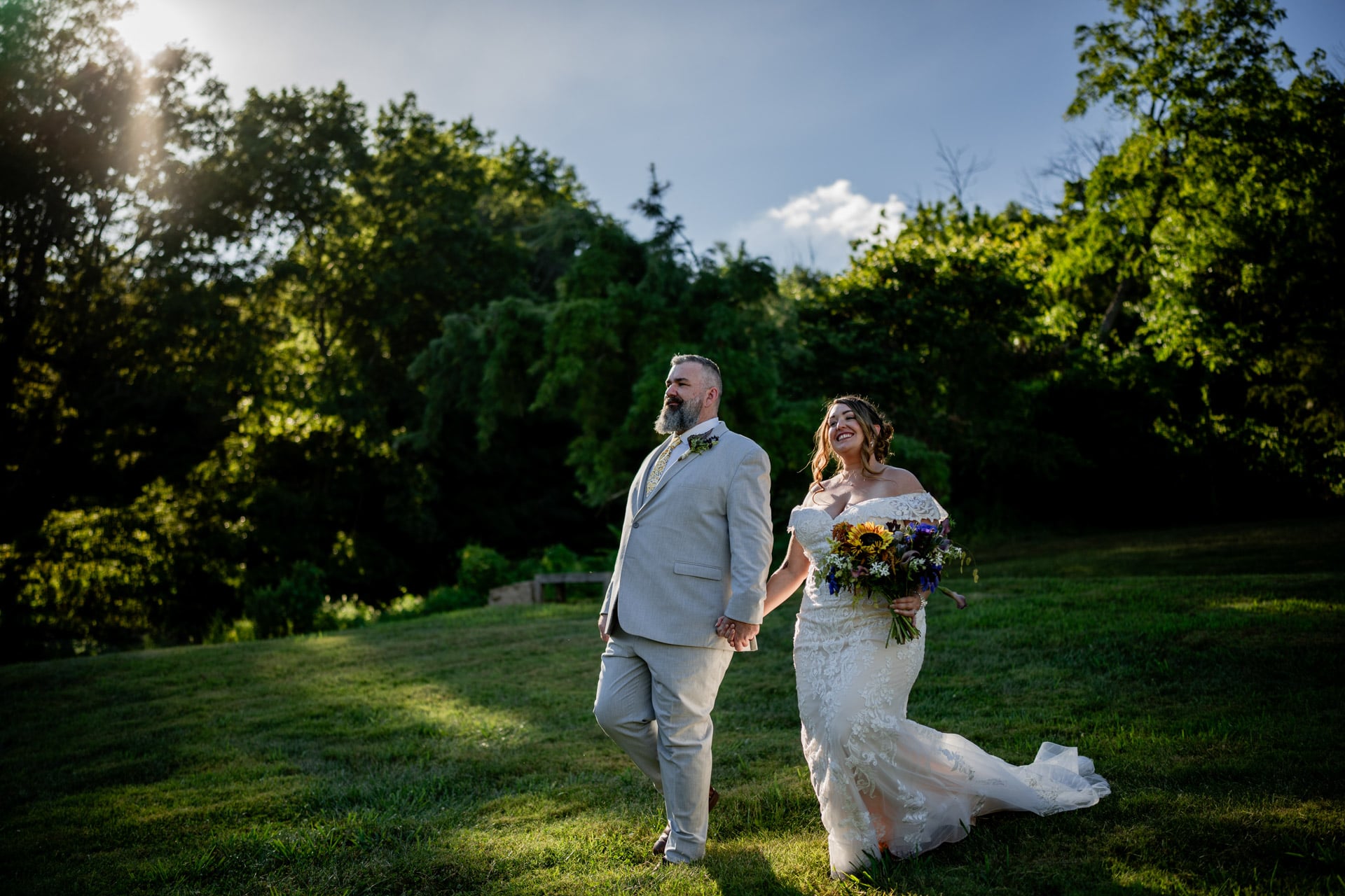 Sunflower Hill Farm couple in field at sunset