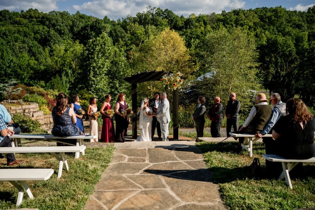 Sun Flower Hill Farm outdoor wedding ceremony with guests and bridal party